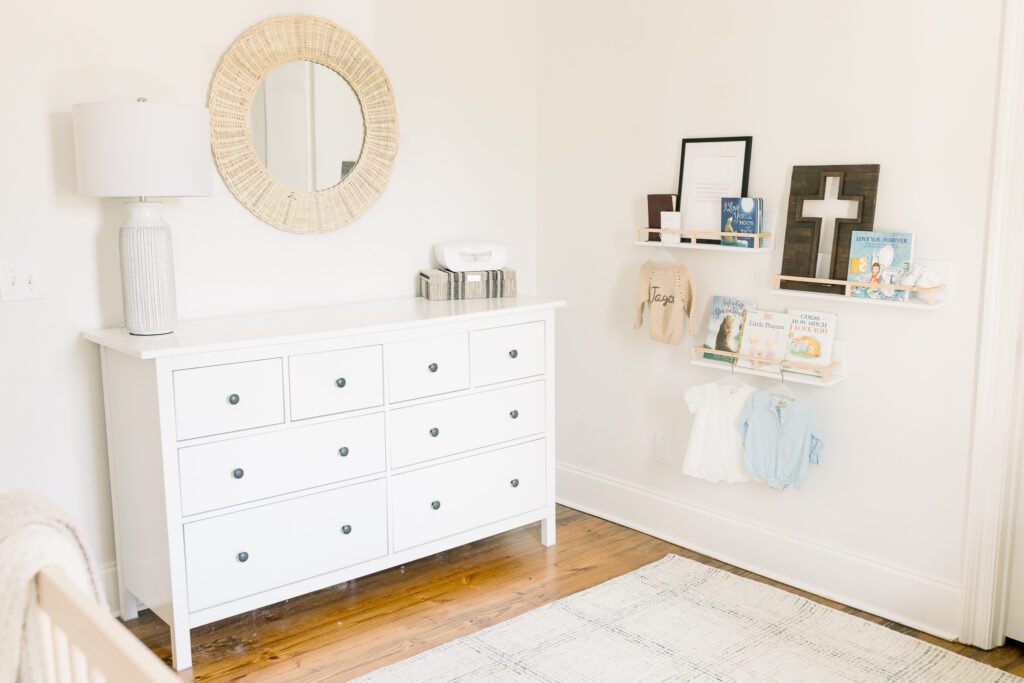 Neutral toned nursery with beautiful natural lighting. Image taken by Madison, MS Newborn Photographer.